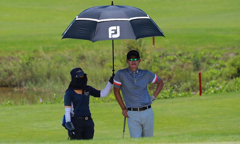 Ô golf giúp golfer che nắng, che mưa, chắn gió